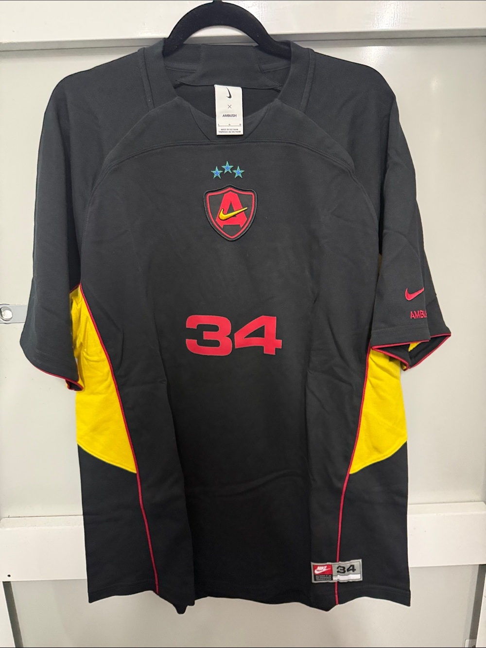 Nike Ambush Black Jersey with Yellow Panels & Red Accents